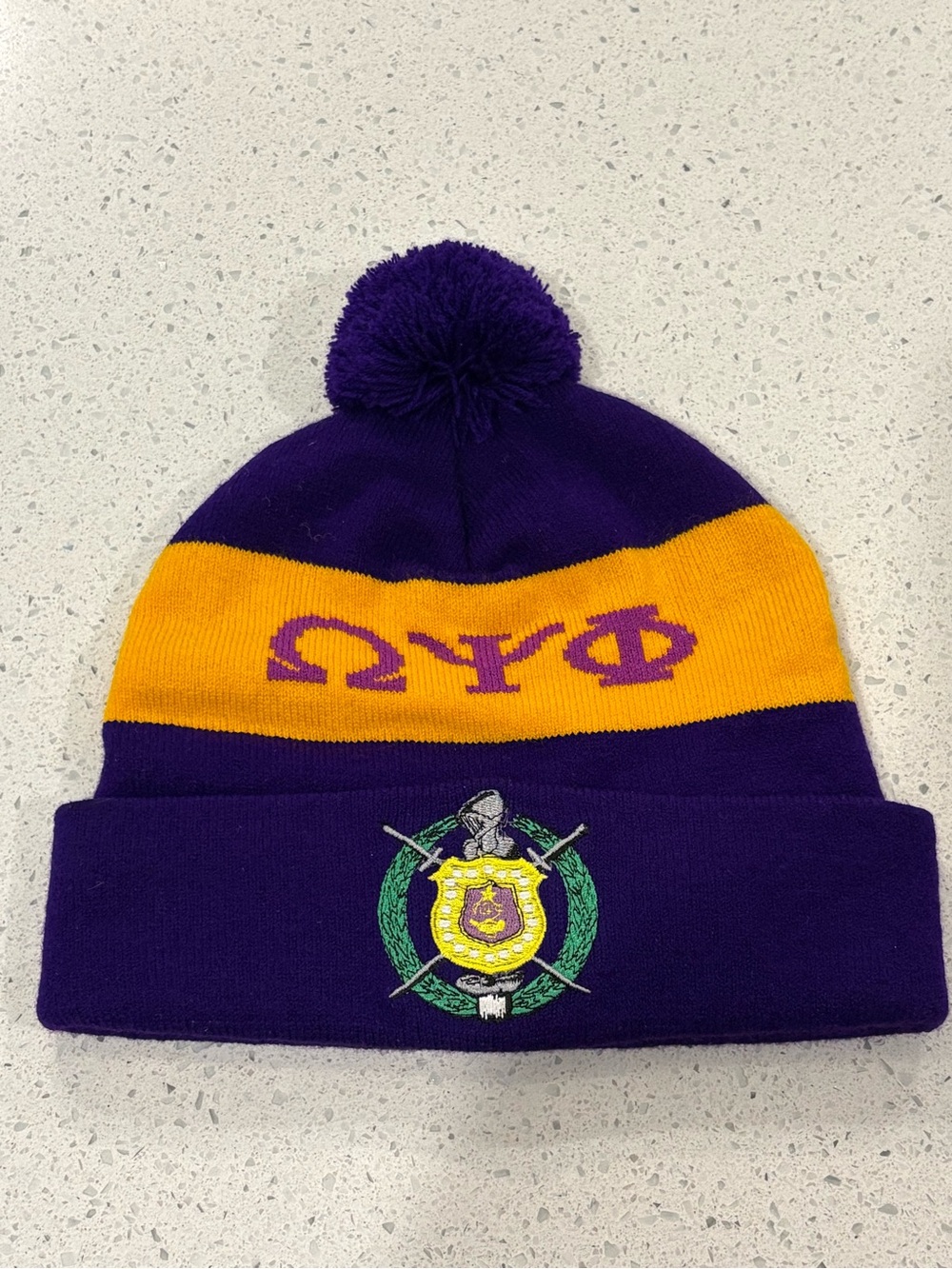 Purple and Gold Pom Pom Knit Beanie with Embroidered Crest
